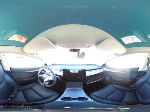 2023 Tesla Model 3 with VIN 5YJ3E1EA4PF631304, listed as a Copart auction lot 52500695 with 33,024 mi miles and Salvage title. Bid and sale history available at DreamBid. Image 12.