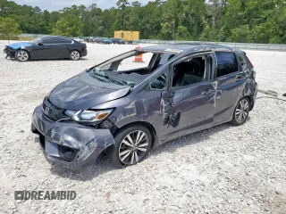 2015 Honda Fit EX-L z VIN 3HGGK5H83FM704698, wystawiony jako Copart lot #57304885 z przebiegiem 182 232 mil mil oraz Nie do naprawy • Non repairable. Historia ofert i sprzedaży dostępna na DreamBid. Obrazek 1.