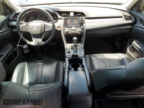 2017 Honda Civic EX-L with VIN 19XFC1F7XHE030606, listed as a Copart auction lot 56536095 with 101,465 mi miles and Salvage title. Bid and sale history available at DreamBid. Image 8.