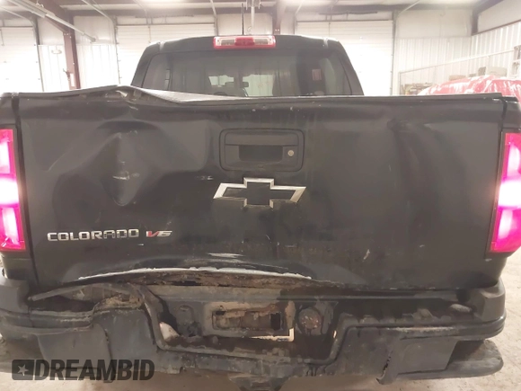 2020 Chevrolet Colorado 4WD Work Truck z VIN 1GCGTBEN2L1178464, wystawiony jako IAAI lot #42020876 z przebiegiem 111 698 mil mil oraz . Historia ofert i sprzedaży dostępna na DreamBid. Obrazek 6.