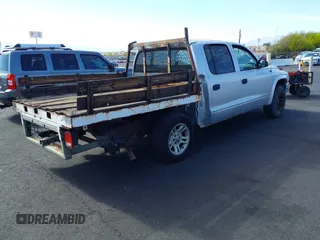 2003 Dodge Dakota SLT with VIN 1D7HL48N33S295059, listed as a IAAI auction lot 42085612 with 176,934 mi miles. Bid and sale history available at carsss.com. Image 4.