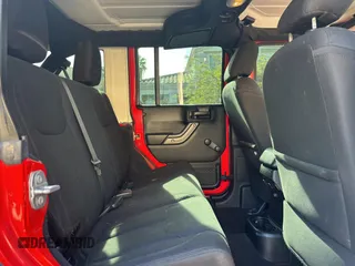 2018 Jeep Wrangler JK Unlimited Sport S with VIN 1C4BJWDG7JL828871, listed as a Copart auction lot 87530425 with 60,958 mi miles and Clean Title. Bid and sale history available at carsss.com. Image 6.