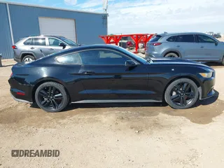 2015 Ford Mustang EcoBoost z VIN 1FA6P8TH9F5355840, wystawiony jako IAAI lot #42552910 z przebiegiem 96 422 mil mil oraz . Historia ofert i sprzedaży dostępna na DreamBid. Obrazek 13.