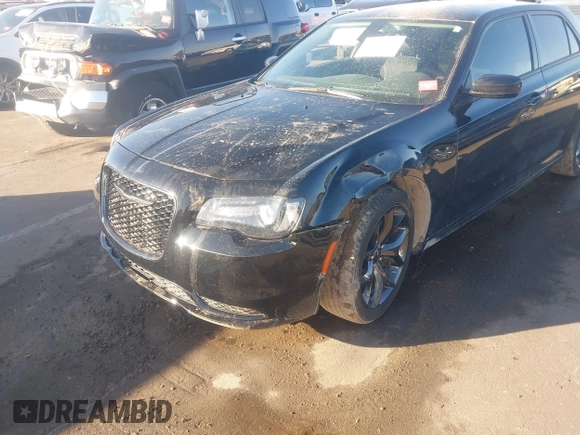 2023 Chrysler 300 Touring with VIN 2C3CCAAG0PH605037, listed as a IAAI auction lot 41149909 with 21,653 mi miles and . Bid and sale history available at DreamBid. Image 6.