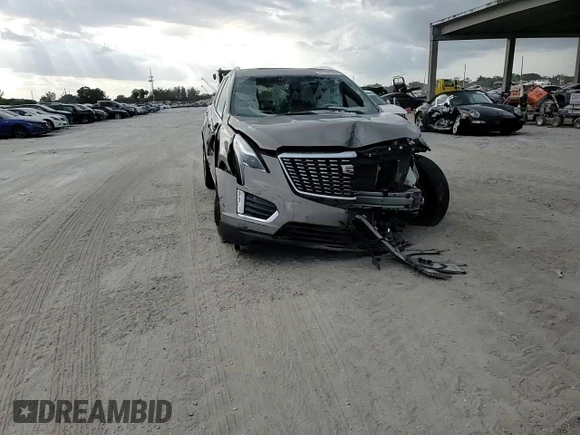 2022 Cadillac XT5 FWD Premium Luxury z VIN 1GYKNCRS4NZ179429, wystawiony jako Copart lot #47180195 z przebiegiem 45 649 mil mil oraz Nie do naprawy • Non repairable. Historia ofert i sprzedaży dostępna na DreamBid. Obrazek 12.