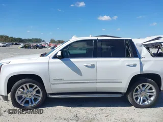 2019 GMC Yukon SLT with VIN 1GKS1BKC9KR332014, listed as a IAAI auction lot 40674460 with 76,545 mi miles. Bid and sale history available at carsss.com. Image 14.