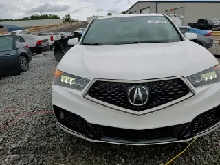 2019 Acura MDX Technology с VIN 5J8YD4H03KL014898, выставлен на аукционе Copart как лот 58891545 с пробегом 115 487 миль миль и Списание • Salvage title. История ставок и продаж доступна на DreamBid. Изображение 13.