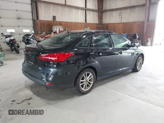 2018 Ford Focus SE with VIN 1FADP3FE8JL209560, listed as a IAAI auction lot 42707236 with 166,017 mi miles and . Bid and sale history available at DreamBid. Image 4.