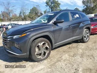 2023 Hyundai Tucson SEL z VIN 5NMJFCAE8PH259733, wystawiony jako Copart lot #80124744 z przebiegiem 26 607 mil mil oraz Szkody całkowita. Historia ofert i sprzedaży dostępna na DreamBid. Obrazek 1.