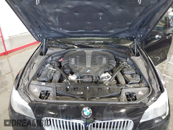 2013 BMW 5 Series 550i xDrive with VIN WBAFU9C56DDY70471, listed as a IAAI auction lot 42158400 with 100,251 mi miles and . Bid and sale history available at carsss.com. Image 10.