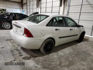 2002 Ford Focus LX with VIN 1FAFP33P52W126344, listed as a Copart auction lot 49757324 with 140,612 mi miles and Salvage Title. Bid and sale history available at DreamBid. Image 3.