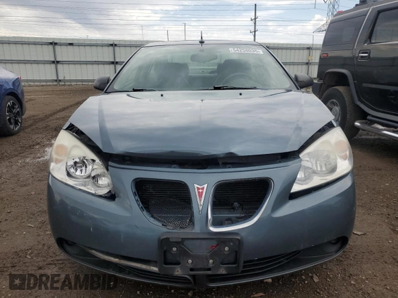 2005 Pontiac G6 GT z VIN 1G2ZH528654165958, wystawiony jako Copart lot #54258035 z przebiegiem 130 806 mil mil oraz Szkoda całkowita • Salvage title. Historia ofert i sprzedaży dostępna na DreamBid. Obrazek 5.