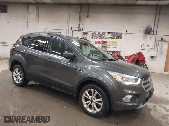 2017 Ford Escape SE with VIN 1FMCU9G9XHUB71008, listed as a IAAI auction lot 40909330 with 181,480 mi miles. Bid and sale history available at carsss.com. Image 1.