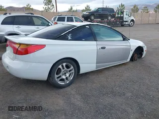 2002 Saturn SC with VIN 1G8ZR12762Z212309, listed as a IAAI auction lot 41857740 with 204,209 mi miles. Bid and sale history available at carsss.com. Image 4.