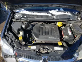 2018 Dodge Grand Caravan SXT with VIN 2C4RDGCGXJR325632, listed as a Copart auction lot 46326655 with 128,692 mi miles and Clean Title. Bid and sale history available at DreamBid. Image 12.