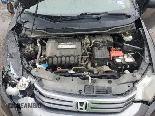 2010 Honda Insight LX with VIN JHMZE2H59AS022362, listed as a Copart auction lot 59442435 with 161,009 mi miles and Salvage title. Bid and sale history available at DreamBid. Image 11.