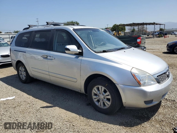 2012 Kia Sedona LX with VIN KNDMG4C72C6445242, listed as a Copart auction lot 54164455 with 143,124 mi miles and Salvage Title. Bid and sale history available at carsss.com. Image 4.