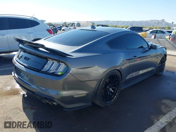 2021 Ford Mustang GT with VIN 1FA6P8CF0M5148961, listed as a IAAI auction lot 42211976 with 14,181 mi miles and . Bid and sale history available at DreamBid. Image 4.