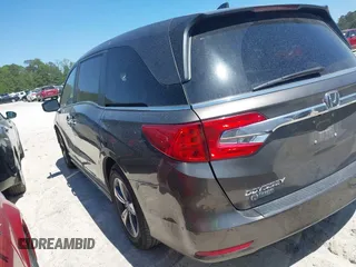 2020 Honda Odyssey Touring with VIN 5FNRL6H87LB002202, listed as a IAAI auction lot 42015741 with 182,051 mi miles and . Bid and sale history available at DreamBid. Image 3.