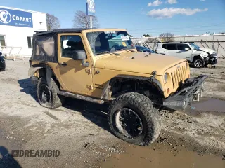 2013 Jeep Wrangler Sport with VIN 1C4AJWAG5DL638636, listed as a Copart auction lot 45197865 with 127,587 mi miles and Salvage title. Bid and sale history available at DreamBid. Image 4.