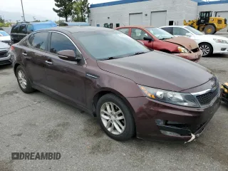 2013 Kia Optima LX z VIN 5XXGM4A74DG102024, wystawiony jako Copart lot #58264275 z przebiegiem 128 594 mil mil oraz Szkoda całkowita • Salvage title. Historia ofert i sprzedaży dostępna na DreamBid. Obrazek 4.