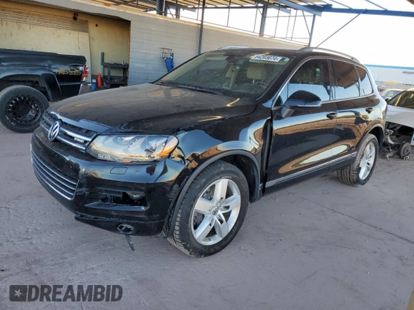 2011 Volkswagen Touareg с VIN WVGFG9BP2BD003056, выставлен на аукционе Copart как лот 84203674 с пробегом 171 456 миль миль и Списание • Salvage title. История ставок и продаж доступна на DreamBid. Изображение 1.