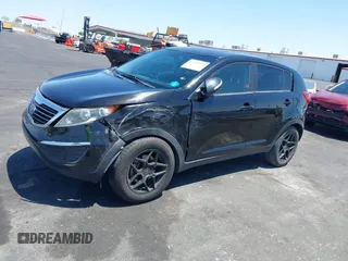 2013 Kia Sportage LX with VIN KNDPBCA25D7449584, listed as a IAAI auction lot 42489414 with 100,993 mi miles and . Bid and sale history available at DreamBid. Image 14.