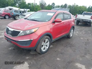 2012 Kia Sportage LX z VIN KNDPBCA23C7252797, wystawiony jako IAAI lot #42354421 z przebiegiem 224 451 mil mil oraz . Historia ofert i sprzedaży dostępna na DreamBid. Obrazek 2.