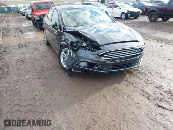 2018 Ford Fusion SE z VIN 3FA6P0HD7JR259606, wystawiony jako IAAI lot #41649797 z przebiegiem 94 094 mil mil oraz . Historia ofert i sprzedaży dostępna na DreamBid. Obrazek 6.