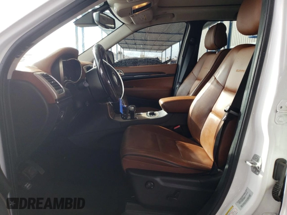 2015 Jeep Grand Cherokee Summit with VIN 1C4RJFJT1FC844975, listed as a Copart auction lot 45424455 with 75,471 mi miles and Salvage Title. Bid and sale history available at carsss.com. Image 7.