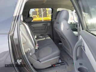 2015 Chevrolet Traverse LS z VIN 1GNKVFEDXFJ134436, wystawiony jako IAAI lot #41773596 z przebiegiem 156 326 mil mil oraz . Historia ofert i sprzedaży dostępna na DreamBid. Obrazek 8.
