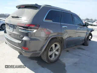 2015 Jeep Grand Cherokee Overland with VIN 1C4RJECT2FC648292, listed as a IAAI auction lot 41806402 with 116,766 mi miles. Bid and sale history available at carsss.com. Image 4.