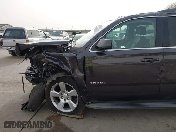 2015 Chevrolet Tahoe LT with VIN 1GNSCBKC5FR504459, listed as a IAAI auction lot 41689405 with 141,783 mi miles and . Bid and sale history available at DreamBid. Image 15.