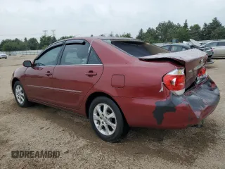 2005 Toyota Camry LE with VIN 4T1BE30KX5U086586, listed as a Copart auction lot 60291715 with 180,421 mi miles and Salvage title. Bid and sale history available at DreamBid. Image 2.