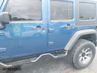 2010 Jeep Wrangler Unlimited Sport with VIN 1J4BA3H11AL144560, listed as a IAAI auction lot 42013032 with 226,233 mi miles. Bid and sale history available at carsss.com. Image 6.