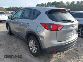 2015 Mazda CX-5 Touring with VIN JM3KE2CYXF0435583, listed as a IAAI auction lot 41737810 with 107,270 mi miles and . Bid and sale history available at DreamBid. Image 3.