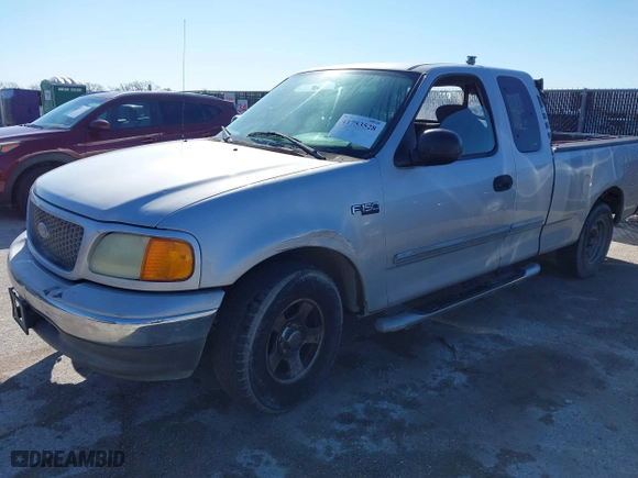 2004 Ford F-150 Heritage XL with VIN 2FTRX17244CA31380, listed as a IAAI auction lot 41753528 with 1 mi miles. Bid and sale history available at carsss.com. Image 2.