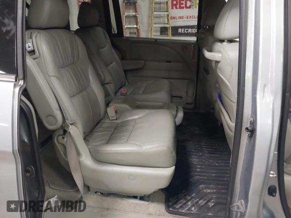 2009 Honda Odyssey EX-L with VIN 5FNRL38789B015524, listed as a IAAI auction lot 42135465 with 242,005 mi miles. Bid and sale history available at carsss.com. Image 8.