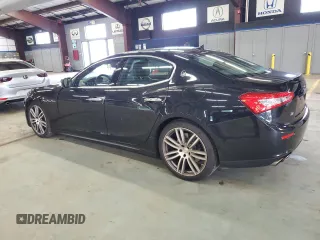 2015 Maserati Ghibli S Q4 with VIN ZAM57RTA3F1150242, listed as a Copart auction lot 61202585 with 21,271 mi miles and Salvage title. Bid and sale history available at DreamBid. Image 2.