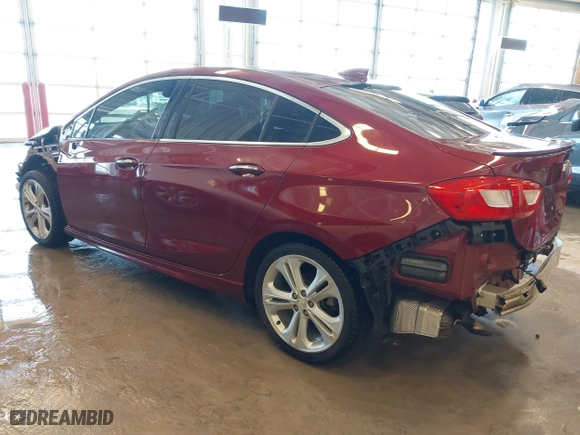 2016 Chevrolet Cruze Premier with VIN 1G1BG5SM2G7302434, listed as a IAAI auction lot 41619114 with 115,684 mi miles. Bid and sale history available at carsss.com. Image 3.