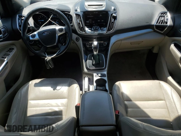 2013 Ford Escape SEL z VIN 1FMCU9H93DUD67848, wystawiony jako Copart lot #57221755 z przebiegiem 129 671 mil mil oraz Czysty tytuł • Clean title. Historia ofert i sprzedaży dostępna na DreamBid. Obrazek 8.