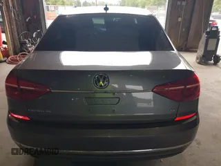 2016 Volkswagen Passat 1.8T SE with VIN 1VWBT7A35GC011129, listed as a IAAI auction lot 39977788 with 123,007 mi miles. Bid and sale history available at carsss.com. Image 16.