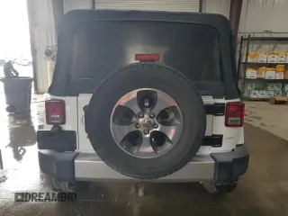 2017 Jeep Wrangler Unlimited Sahara z VIN 1C4BJWEG4HL701813, wystawiony jako Copart lot #60147255 z przebiegiem 49 924 mil mil oraz Szkoda całkowita • Salvage title. Historia ofert i sprzedaży dostępna na DreamBid. Obrazek 6.