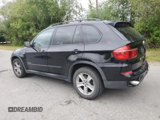 2012 BMW X5 35d with VIN 5UXZW0C54CL671377, listed as a Copart auction lot 60936395 with 105,903 mi miles and Salvage title. Bid and sale history available at DreamBid. Image 2.