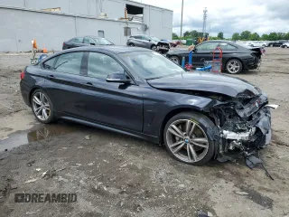 2015 BMW 4 Series 435i with VIN WBA4B1C56FD955408, listed as a Copart auction lot 57146495 with 81,258 mi miles and Salvage title. Bid and sale history available at DreamBid. Image 4.