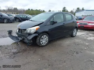 2012 Toyota Yaris L with VIN JTDKTUD30CD539341, listed as a IAAI auction lot 41981342 with 210,253 mi miles. Bid and sale history available at carsss.com. Image 2.