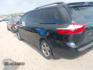 2017 Toyota Sienna LE Auto Access Seat with VIN 5TDKZ3DC7HS827068, listed as a IAAI auction lot 42088371 with 114,630 mi miles. Bid and sale history available at carsss.com. Image 3.