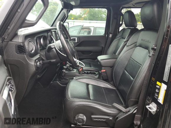 2020 Jeep Wrangler Unlimited Sahara with VIN 1C4HJXEG9LW337590, listed as a Copart auction lot 59197125 with 57,733 mi miles and Salvage title. Bid and sale history available at DreamBid. Image 7.