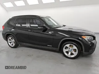 2014 BMW X1 sDrive28i with VIN WBAVM1C58EVW50919, listed as a Copart auction lot 49608985 with 219,971 mi miles and Clean Title. Bid and sale history available at carsss.com. Image 4.