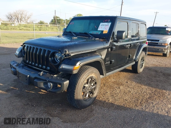 2023 Jeep Wrangler Sport S with VIN 1C4HJXDG2PW582318, listed as a IAAI auction lot 42011653 with 25,338 mi miles and . Bid and sale history available at DreamBid. Image 2.